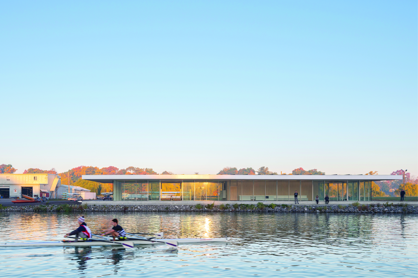 East elevation of the NCRC from the Martindale Pond with rowers on Henley Rowing Course